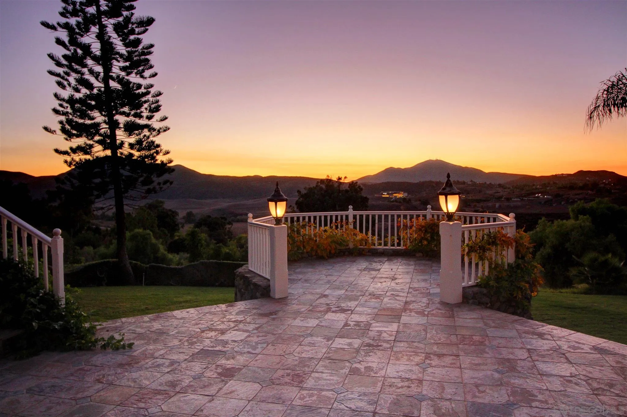 15245 Presilla Drive Jamul, CA 91935 - Photo 10 of 57 a view of a house with a yard and mountain