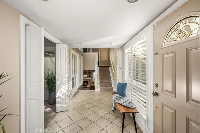a view of front door with furniture and a livingroom