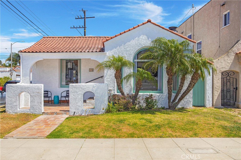 134 Prospect Avenue Long Beach, CA 90803 - Photo 1 of 21 a front view of a house with garden