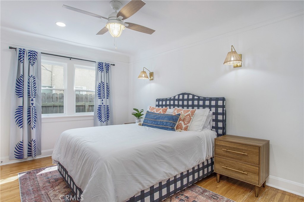 134 Prospect Avenue Long Beach, CA 90803 - Photo 14 of 21 a bedroom with a bed and a window