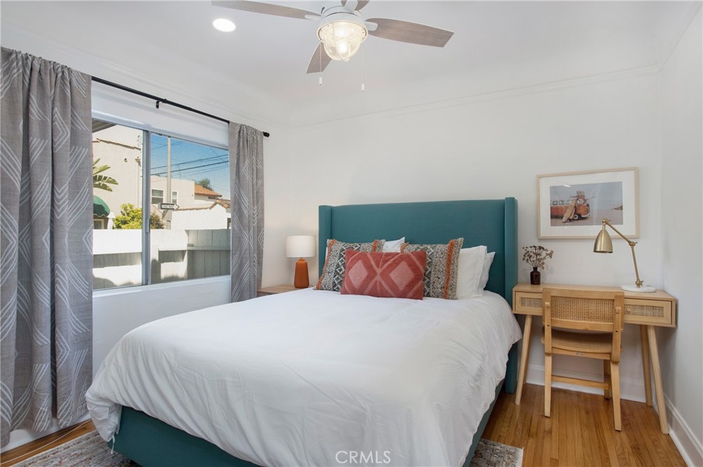 134 Prospect Avenue Long Beach, CA 90803 - Photo 21 of 21 a bedroom with a bed and a table