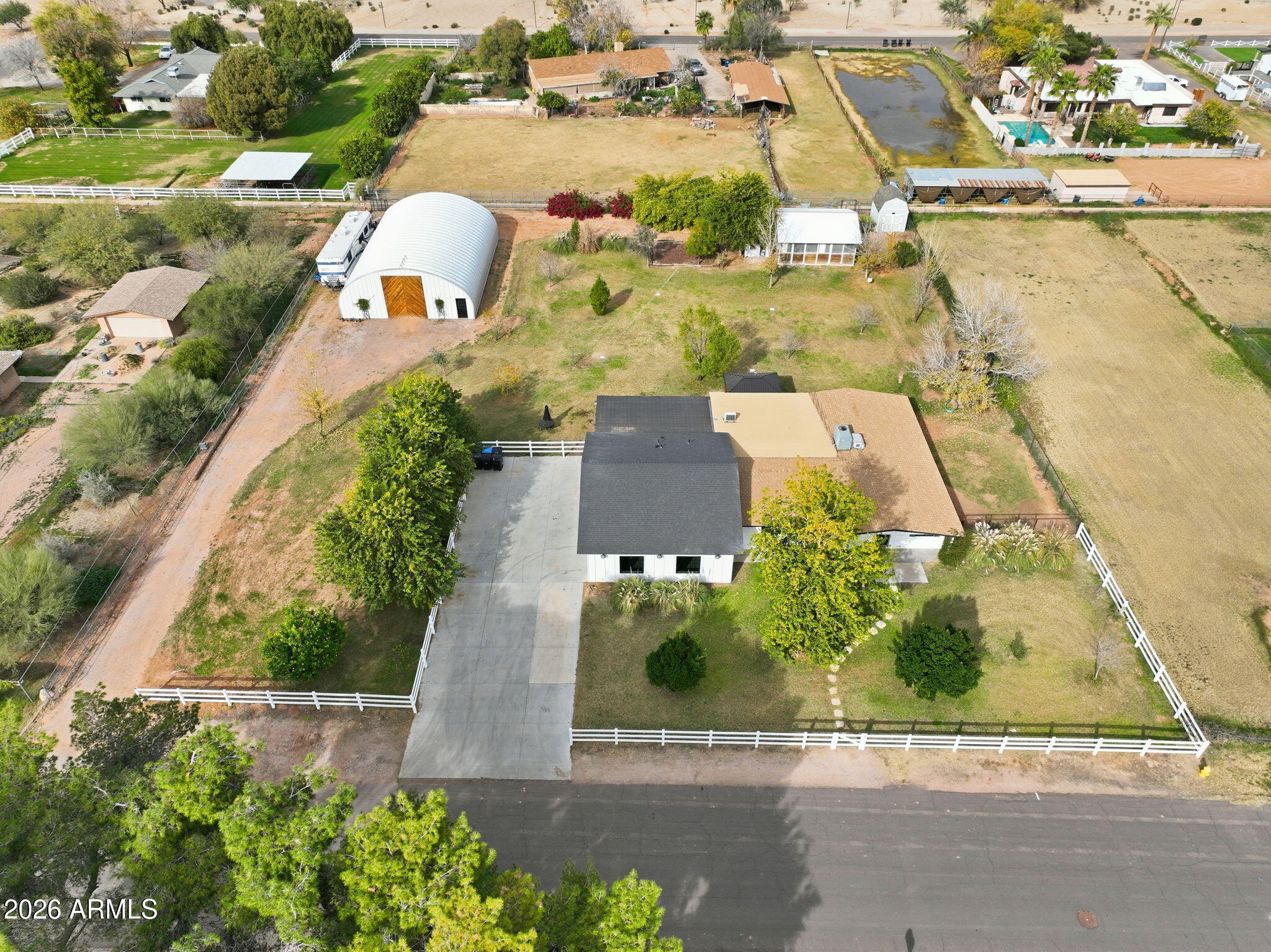 2858 East Redfield Road Gilbert, AZ 85234 - Photo 3 of 60 an aerial view of residential houses with outdoor space and parking