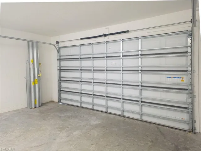 a view of a room with toys and racks on the wall