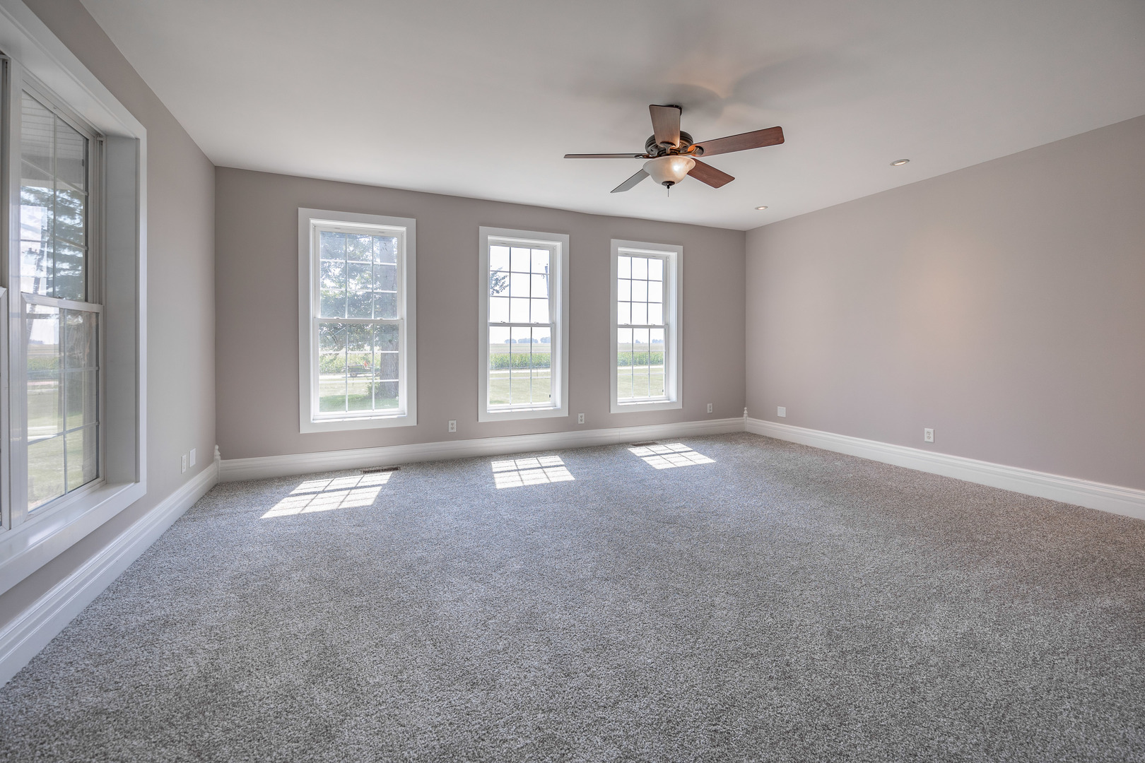 1353 Pine Hill Road Amboy, IL 61310 - Photo 21 of 91 a view of a livingroom with a ceiling fan and window