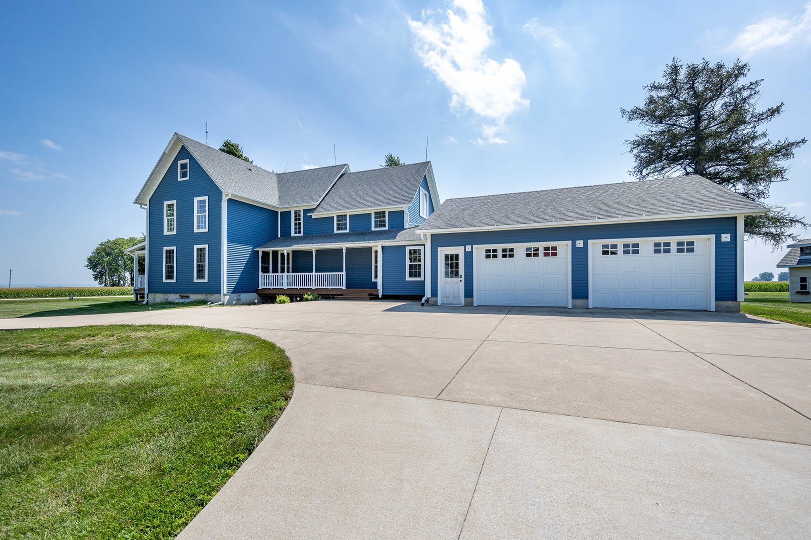 1353 Pine Hill Road Amboy, IL 61310 - Photo 3 of 91 a front view of a house with a yard