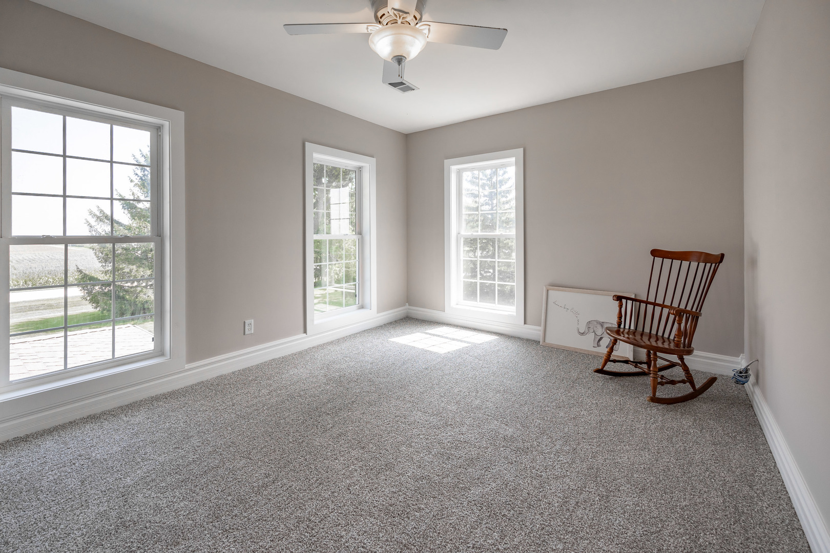1353 Pine Hill Road Amboy, IL 61310 - Photo 37 of 91 a view of a livingroom with furniture and a ceiling fan