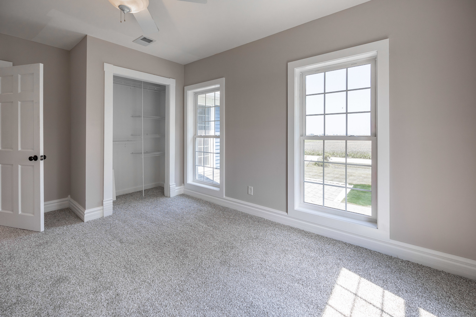 1353 Pine Hill Road Amboy, IL 61310 - Photo 38 of 91 an empty room with windows and closet