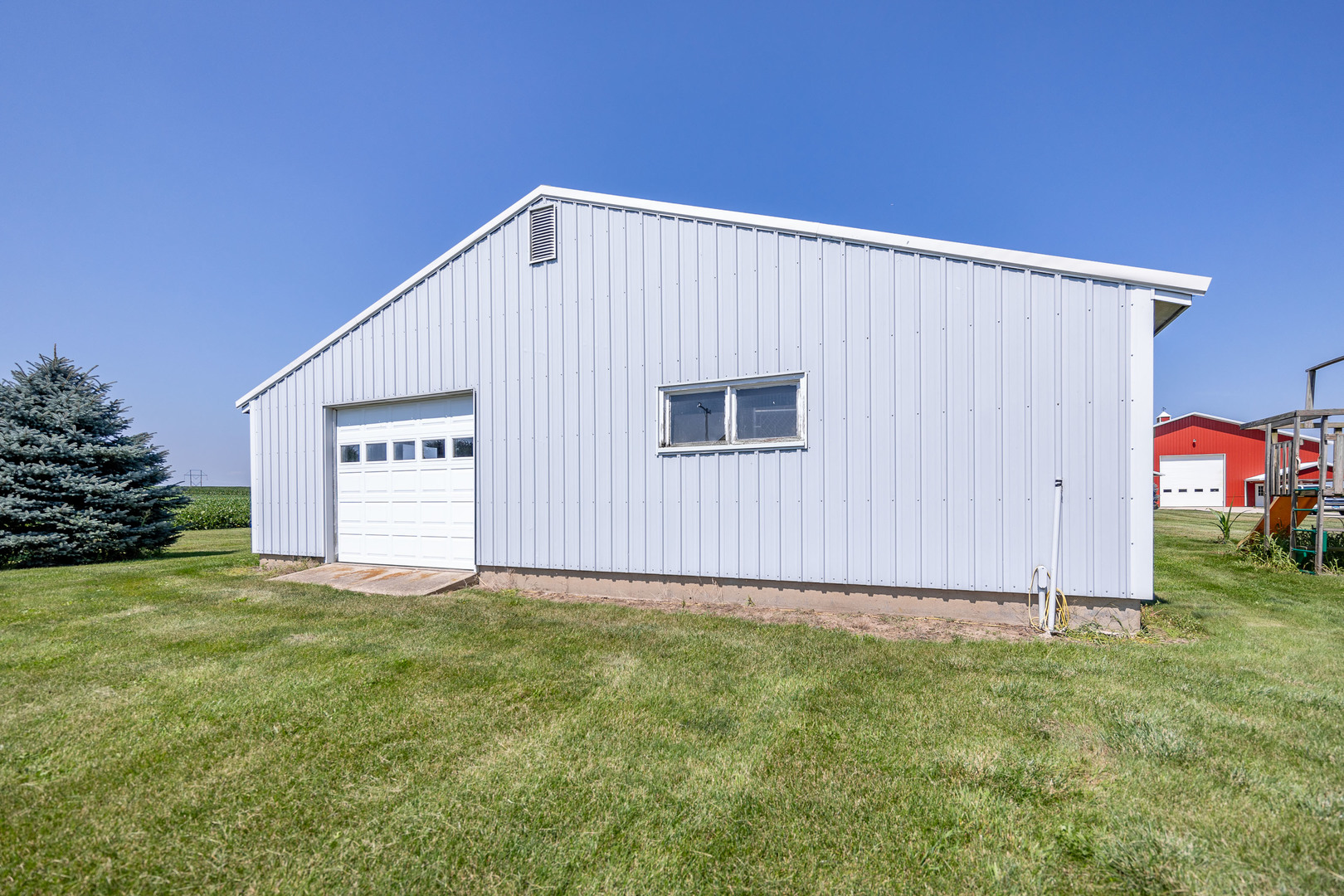 1353 Pine Hill Road Amboy, IL 61310 - Photo 72 of 91 a view of a house with backyard