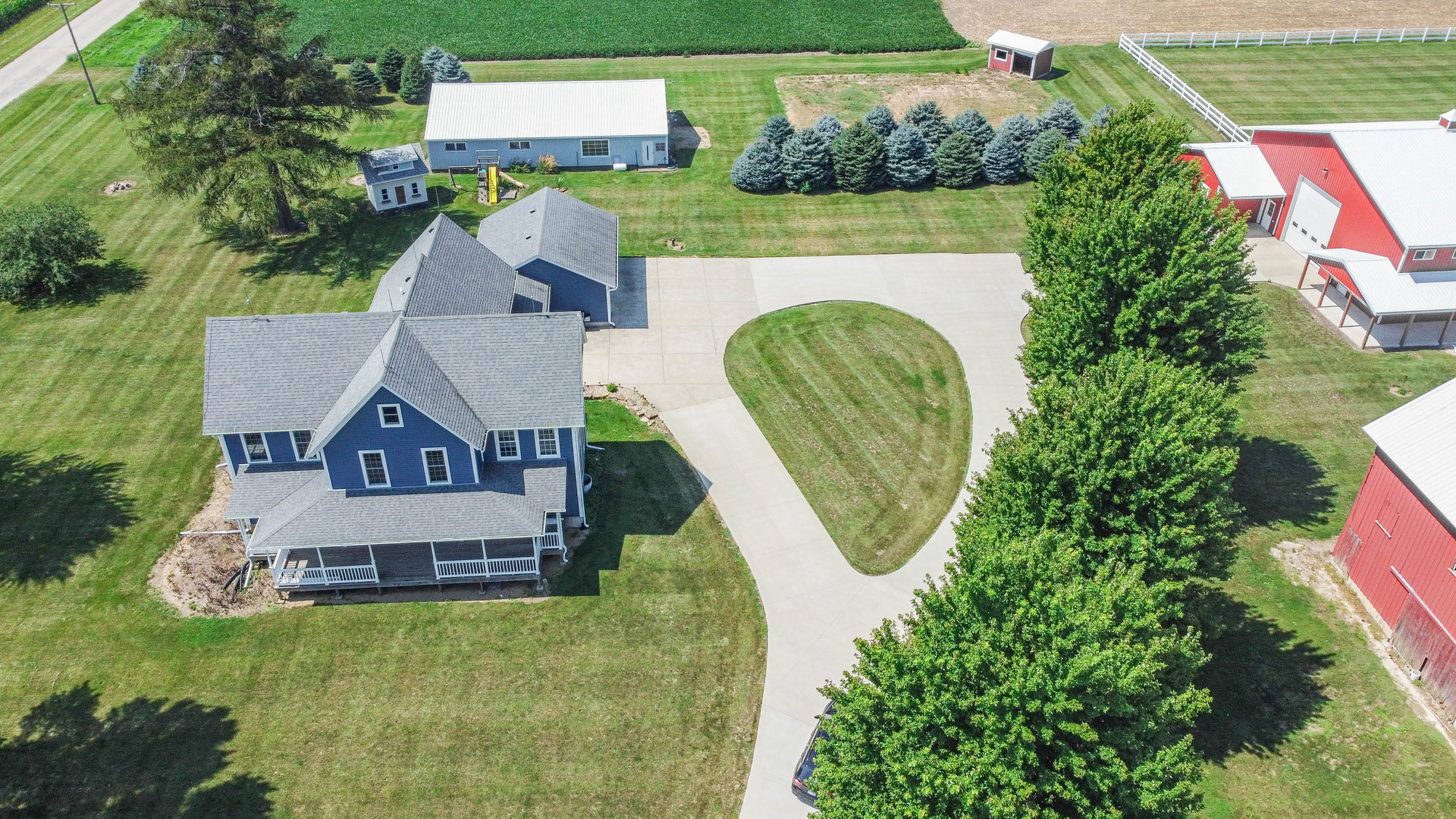 1353 Pine Hill Road Amboy, IL 61310 - Photo 90 of 91 an aerial view of a house with swimming pool garden and mountain view