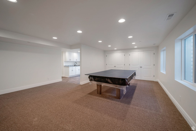 1288 North Horizon View Loop Elk Ridge, UT 84651 - Photo 32 of 40 Recreation room featuring recessed lighting and dark carpet