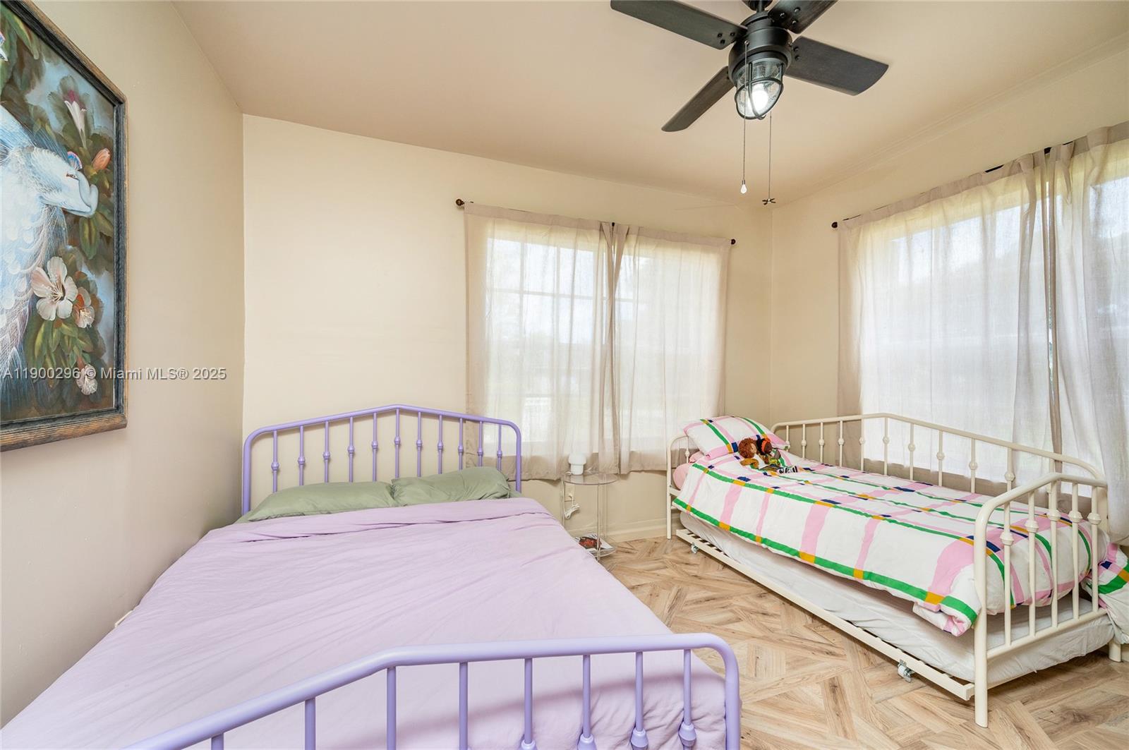 1844 Northwest 47th Street Miami, FL 33142 - Photo 11 of 24 a bedroom with a bed and window