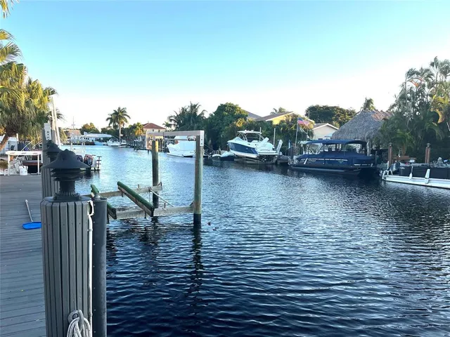 a view of a swimming pool with a lounge chairs