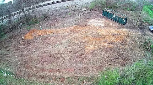 a view of a yard with a trees