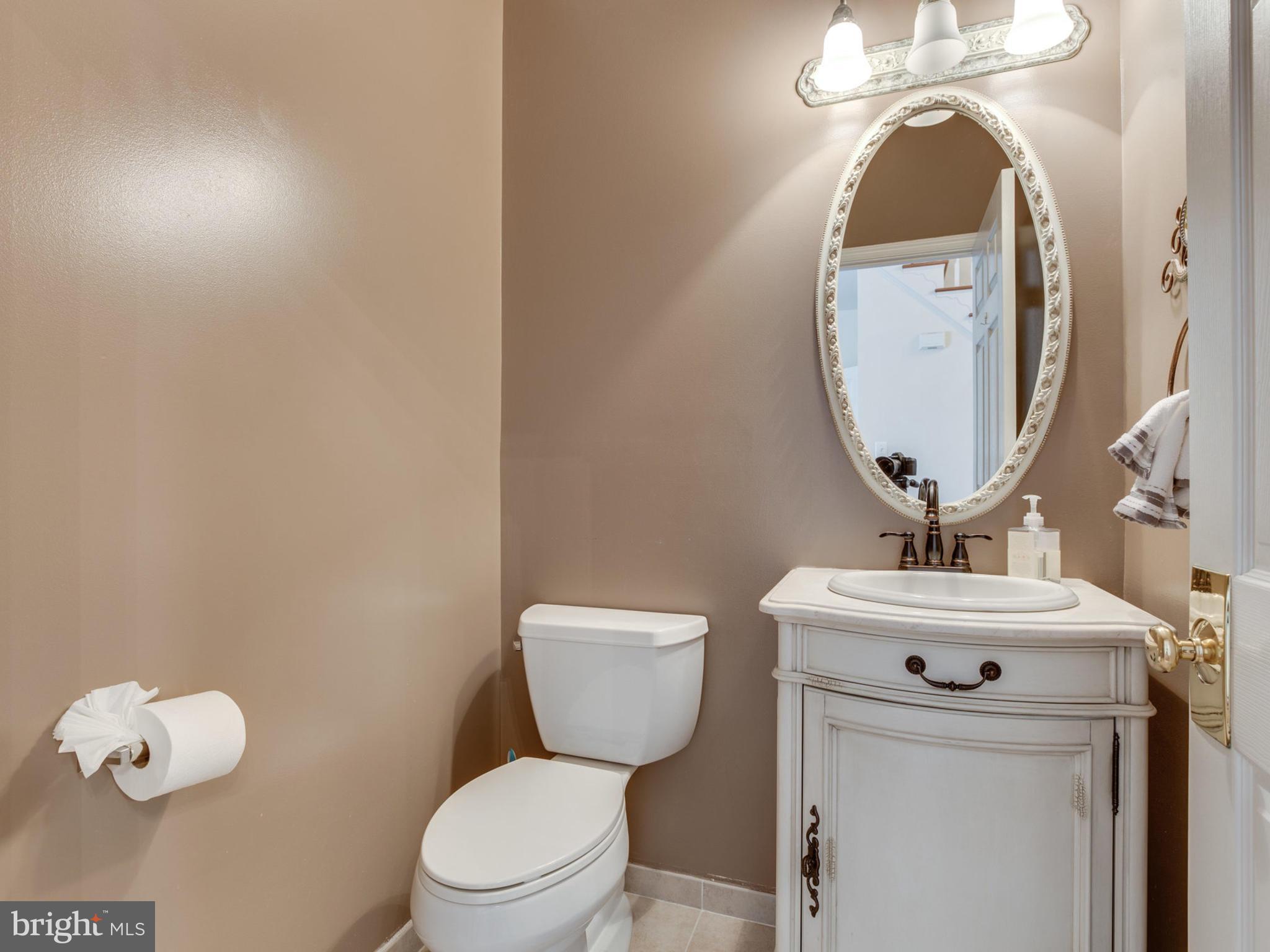 10879 Hunter Gate Way Reston, VA 20194 - Photo 3 of 30 main floor half bath