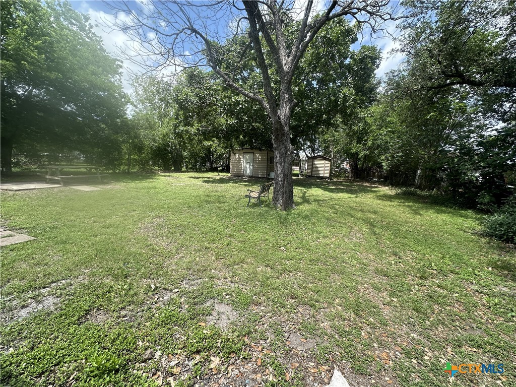 2006 Meadowlane Street Victoria, TX 77901 - Photo 15 of 15 a view of outdoor space with deck and yard