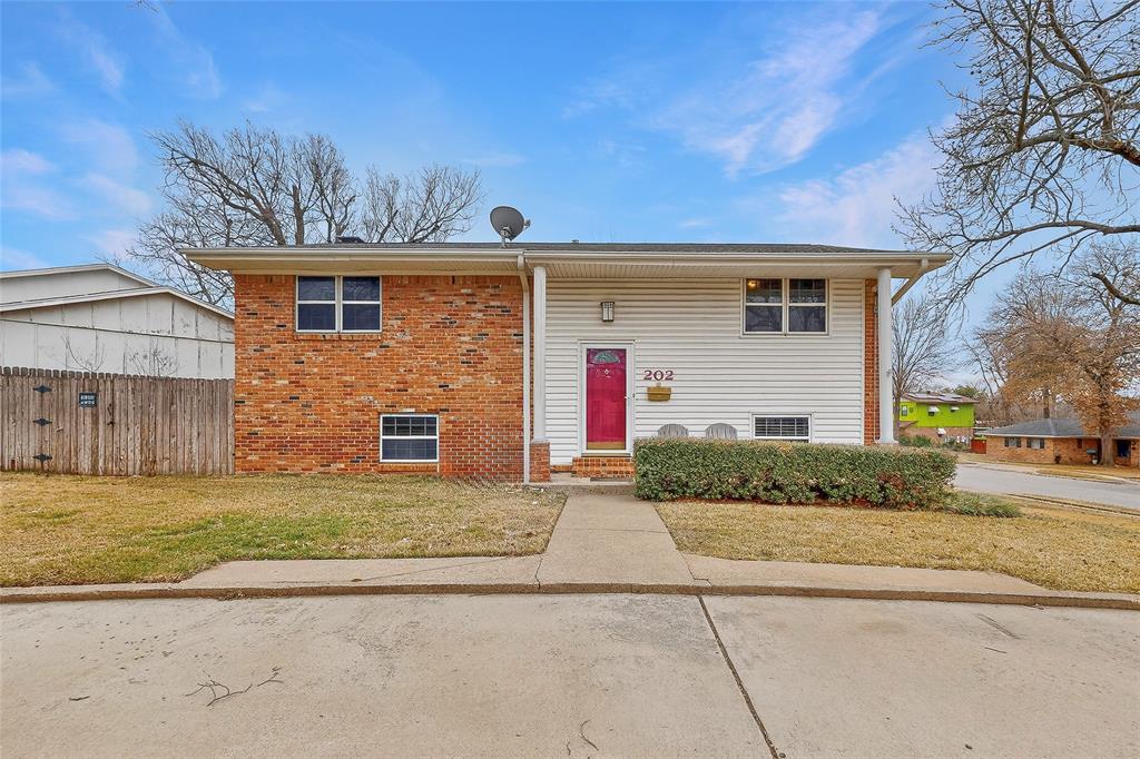 202 Senter Valley Road Irving, TX 75060 - Photo 2 of 32 Two-story residence featuring a brick and siding exterior