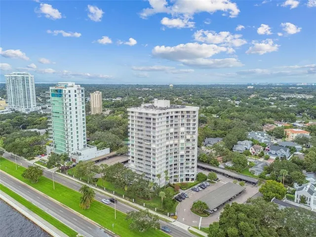 a view of terrace with lawn chairs