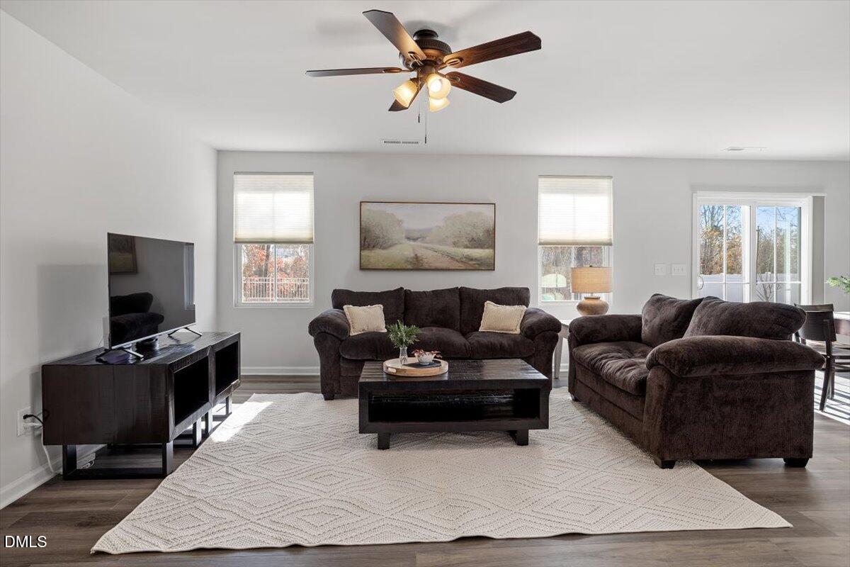 278 Hunting Wood Drive Angier, NC 27501 - Photo 14 of 36 a living room with furniture and a flat screen tv
