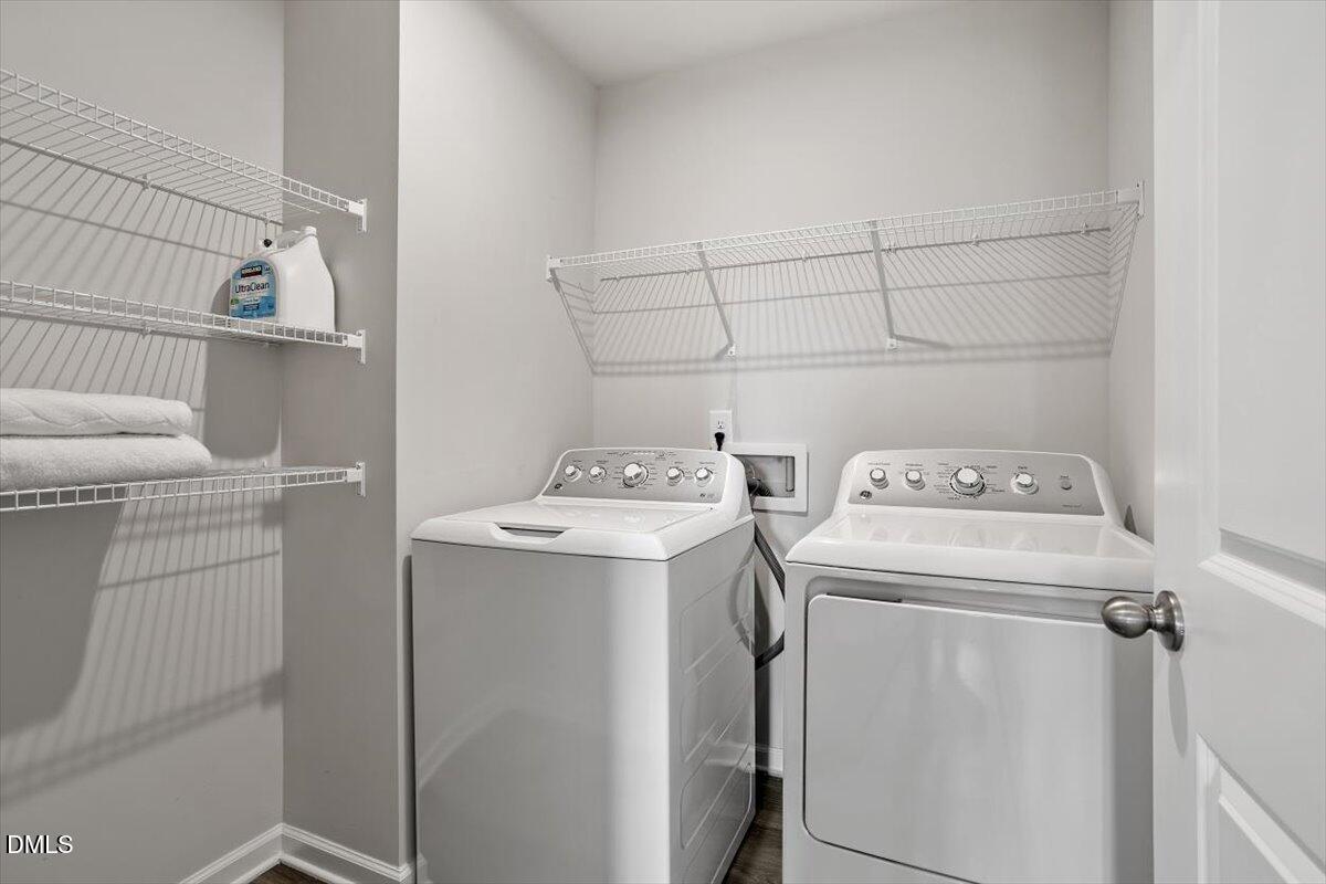278 Hunting Wood Drive Angier, NC 27501 - Photo 28 of 36 a utility room with dryer and washer