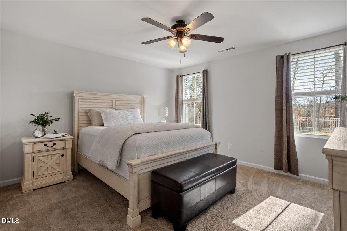 278 Hunting Wood Drive Angier, NC 27501 - Photo 29 of 36 a bed room with a bed and a window