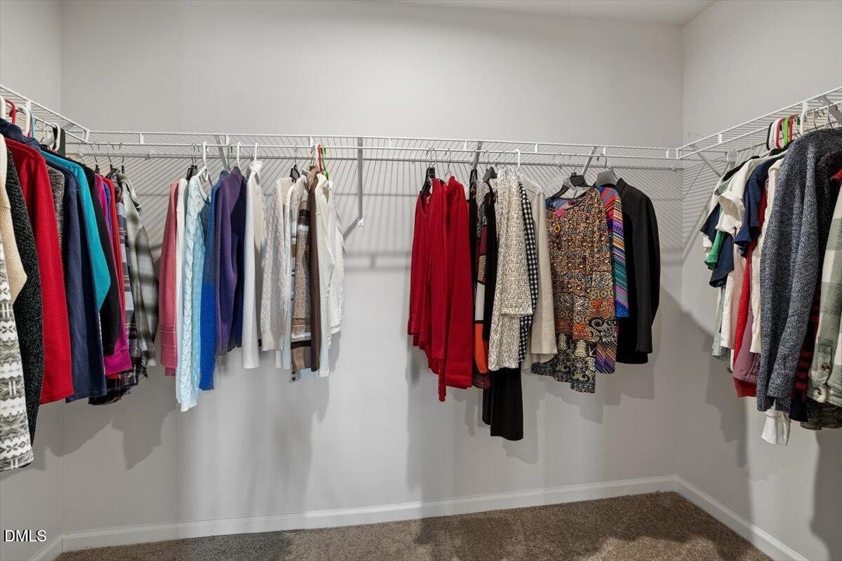 278 Hunting Wood Drive Angier, NC 27501 - Photo 35 of 36 a view of walk in closet with clothes