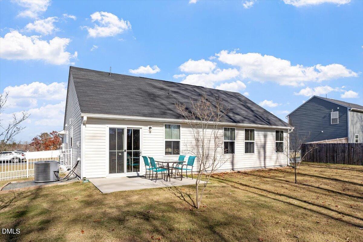 278 Hunting Wood Drive Angier, NC 27501 - Photo 4 of 36 a front view of a house with a yard