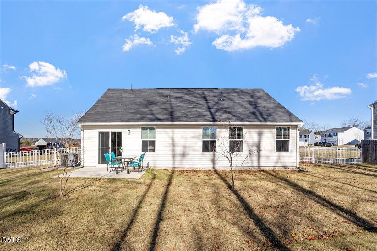 278 Hunting Wood Drive Angier, NC 27501 - Photo 5 of 36 a front view of a house with a yard