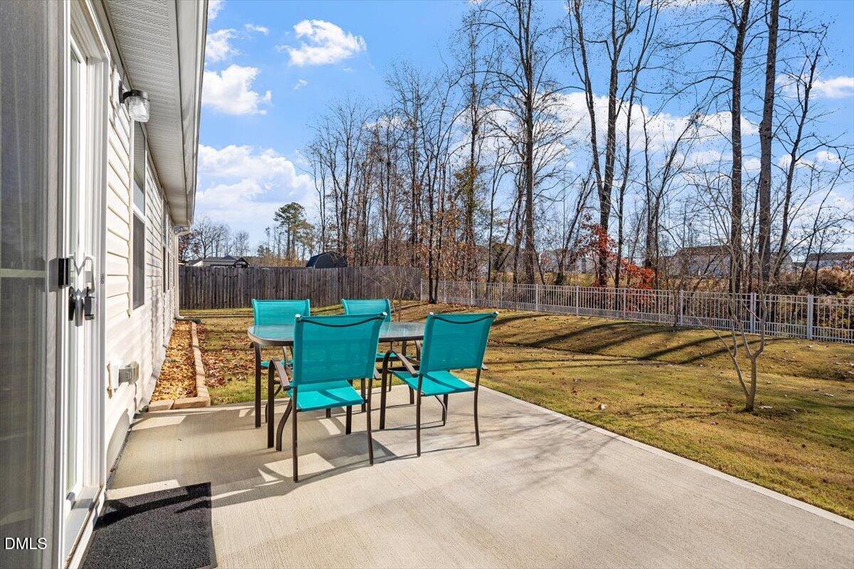 278 Hunting Wood Drive Angier, NC 27501 - Photo 7 of 36 a view of a swimming pool with a lounge chairs