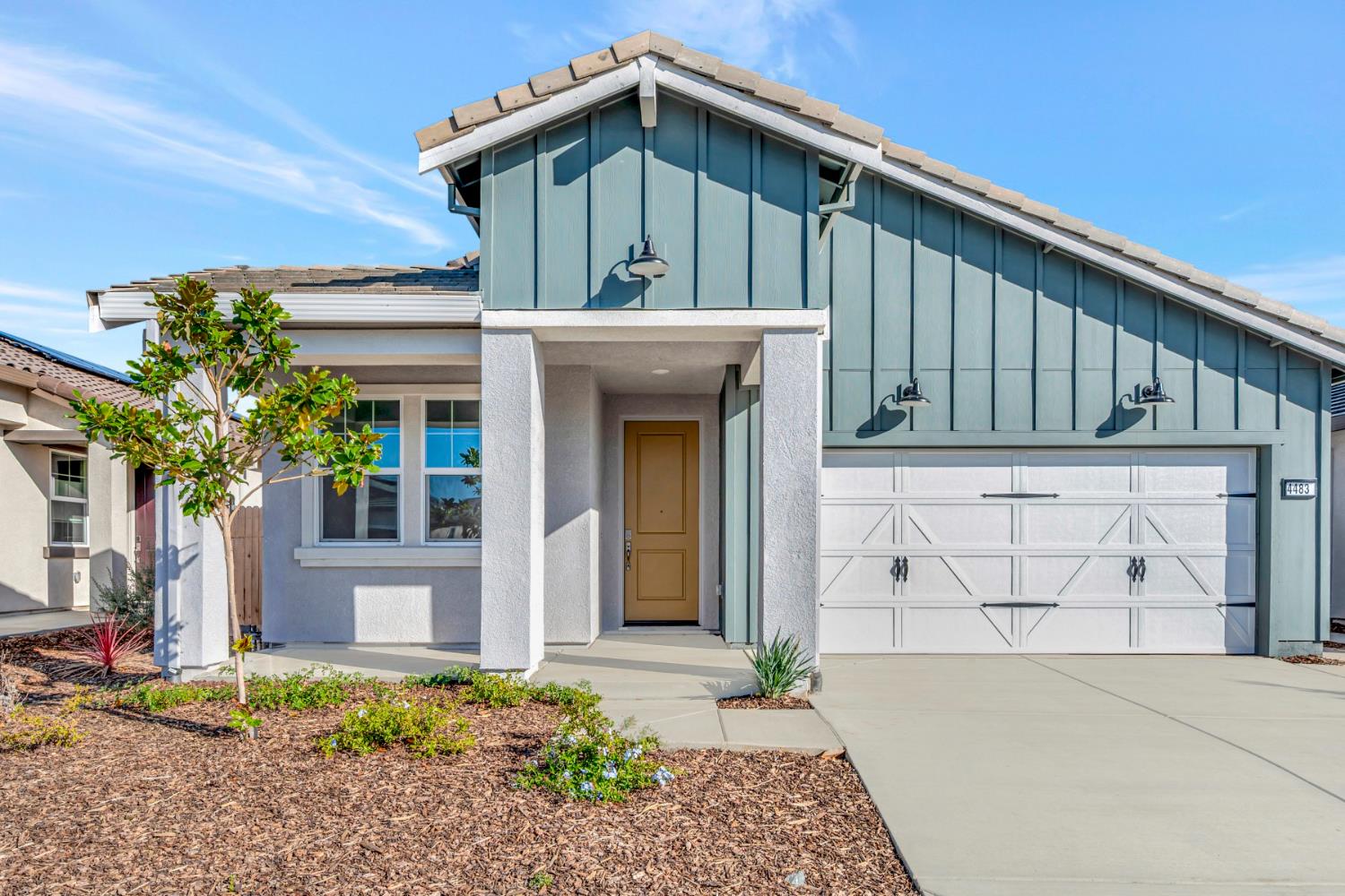 4483 Doric Way Rancho Cordova, CA 95742 - Photo 1 of 1 a front view of a house with garden