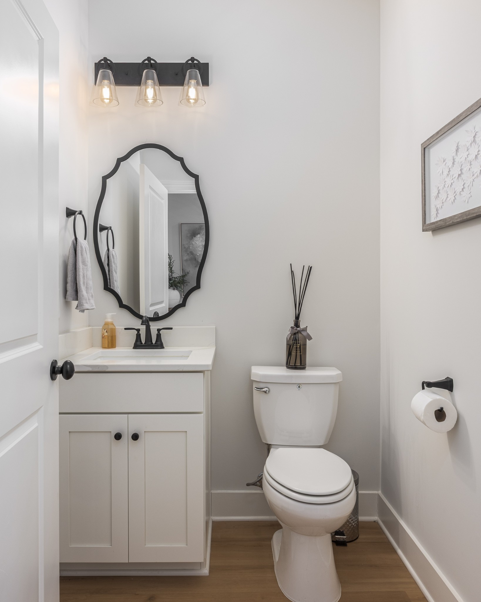 2159 Carpenter Bridge Road Columbia, TN 38401 - Photo 31 of 72 a bathroom with a toilet sink and mirror