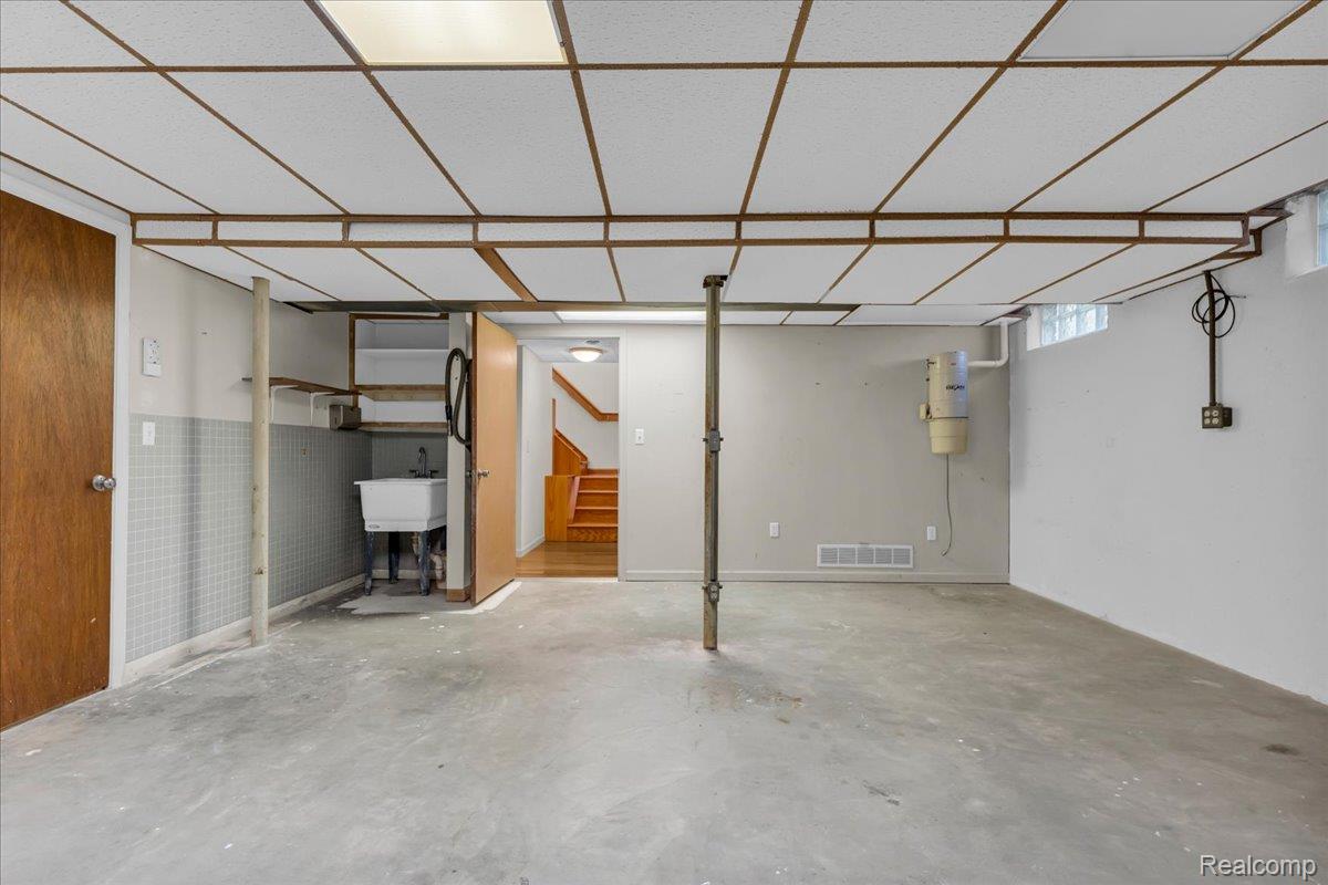 1156 Seneca Road Lake Orion, MI 48362 - Photo 37 of 50 Basement with a drop ceiling and stairway