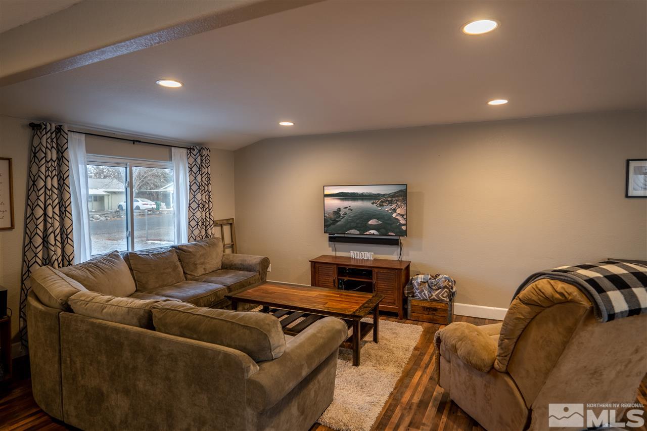 9335 Fremont Way Reno, NV 89506 - Photo 5 of 16 a living room with furniture and a flat screen tv