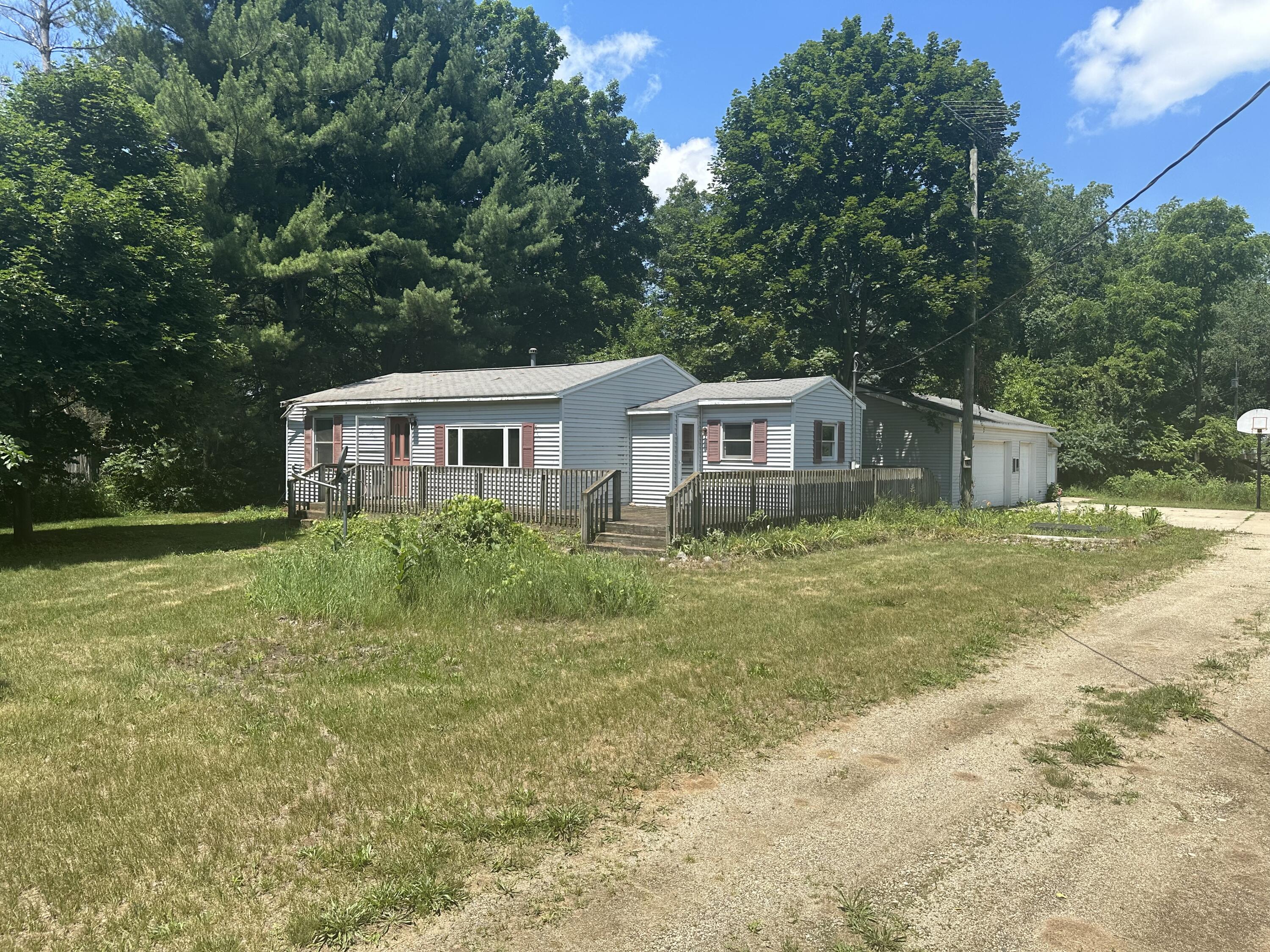 14980 Hall Road Ravenna, MI 49451 - Photo 4 of 22 Side of home