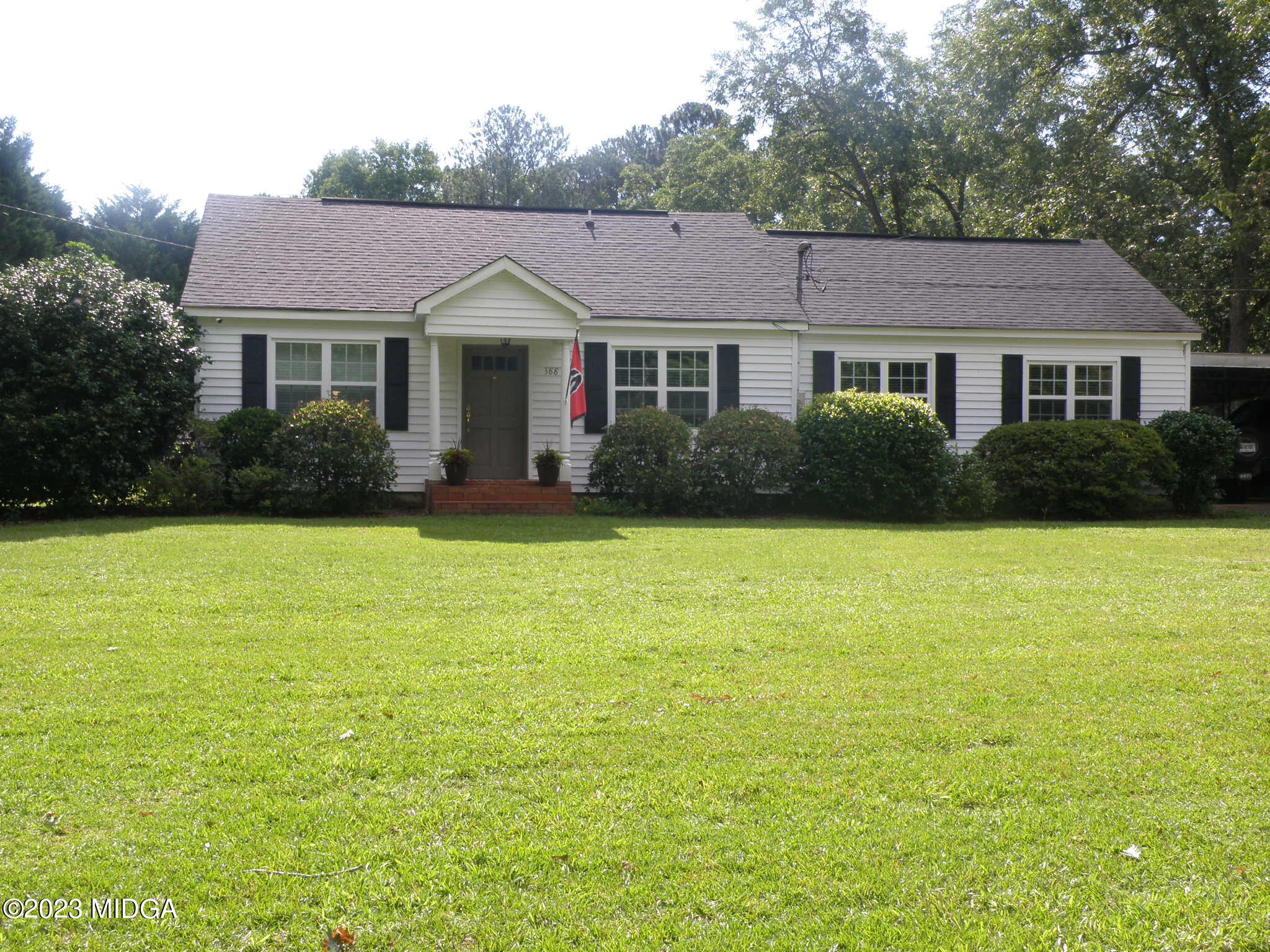 388 Fairview Church Road Forsyth, GA 31029 - Photo 1 of 41 a front view of a house with yard and green space