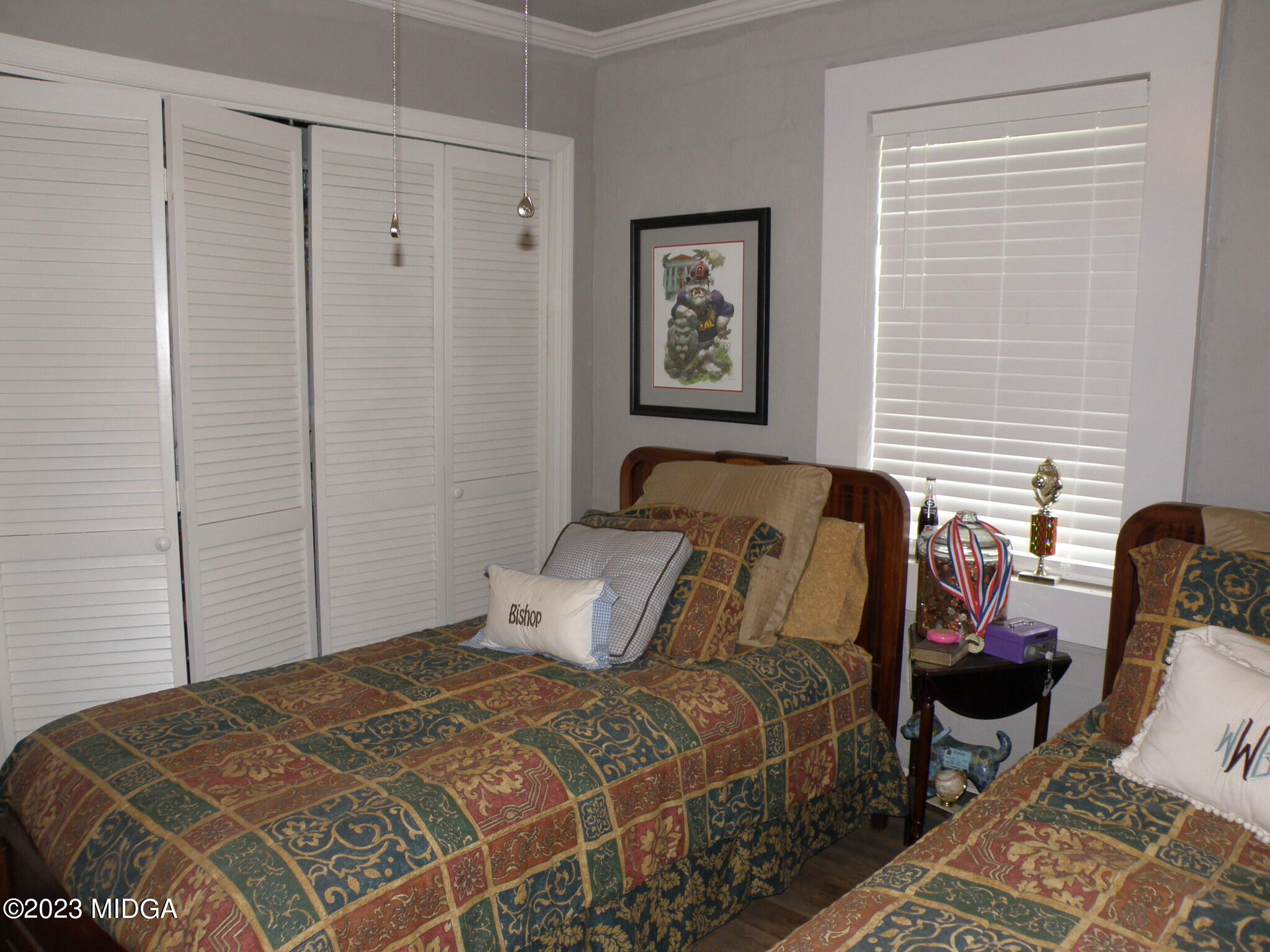 388 Fairview Church Road Forsyth, GA 31029 - Photo 20 of 41 a bedroom with a bed and a window