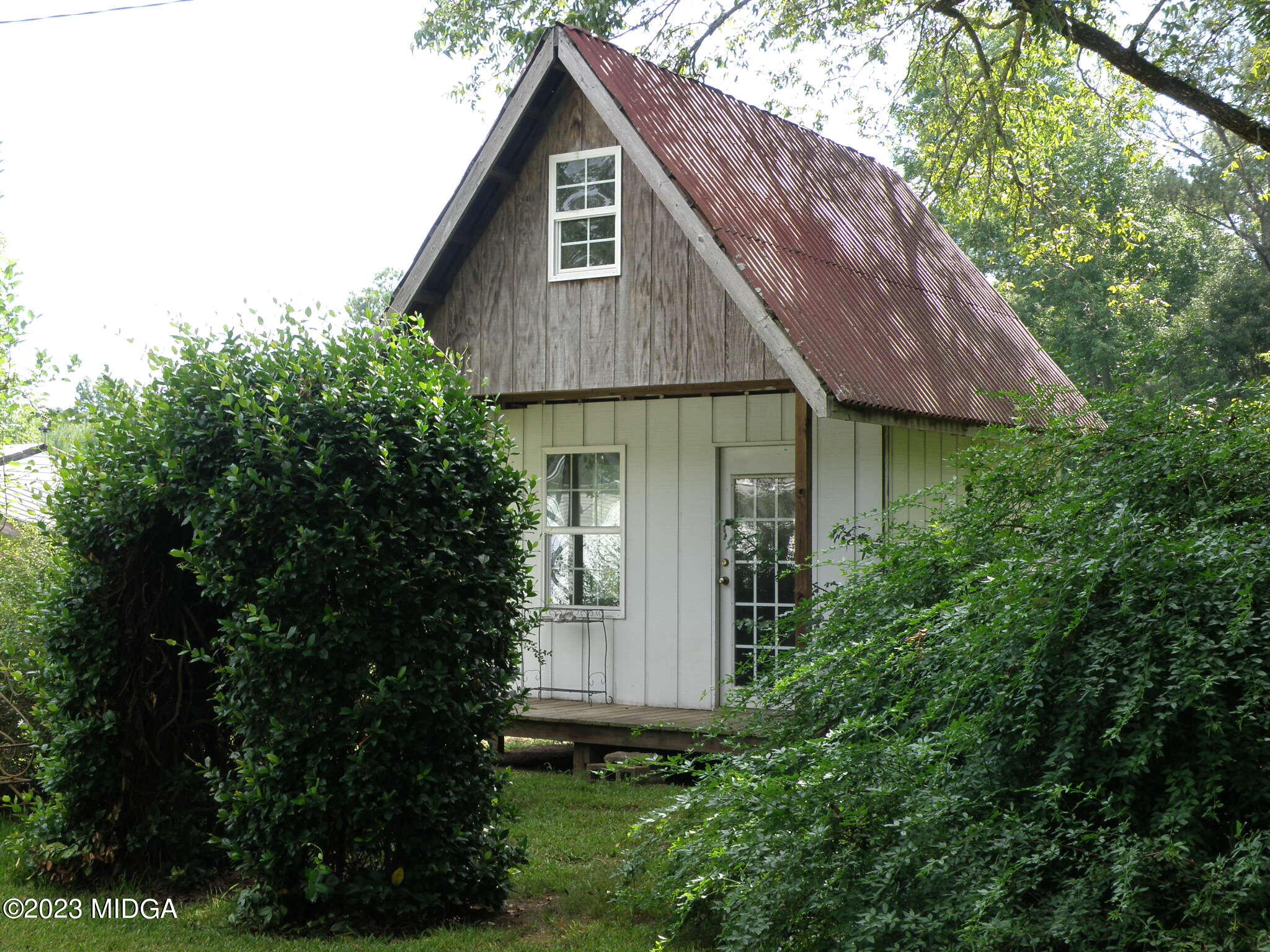 388 Fairview Church Road Forsyth, GA 31029 - Photo 29 of 41 a front view of a house with a garden
