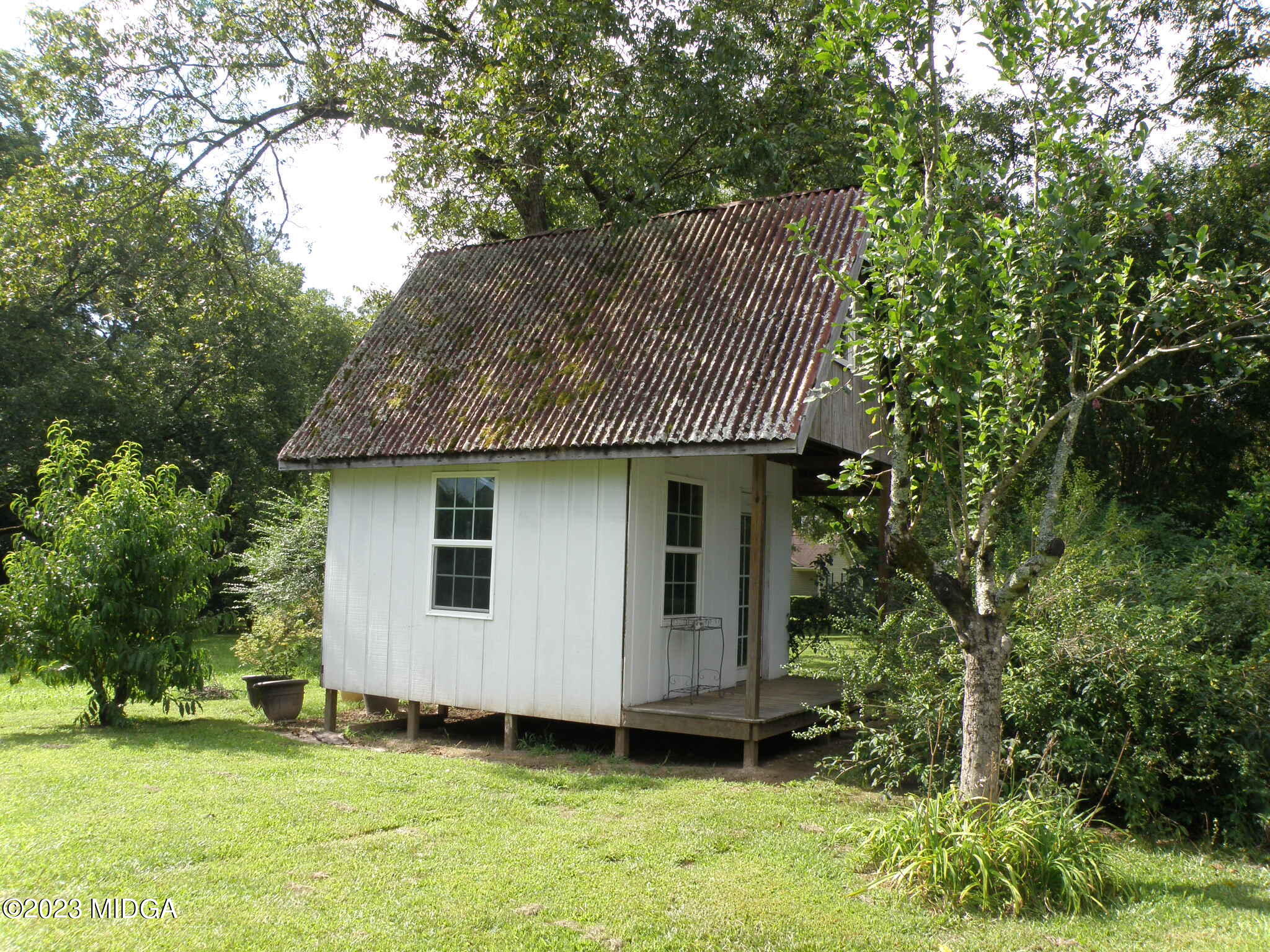 388 Fairview Church Road Forsyth, GA 31029 - Photo 31 of 41 a view of a house with a yard