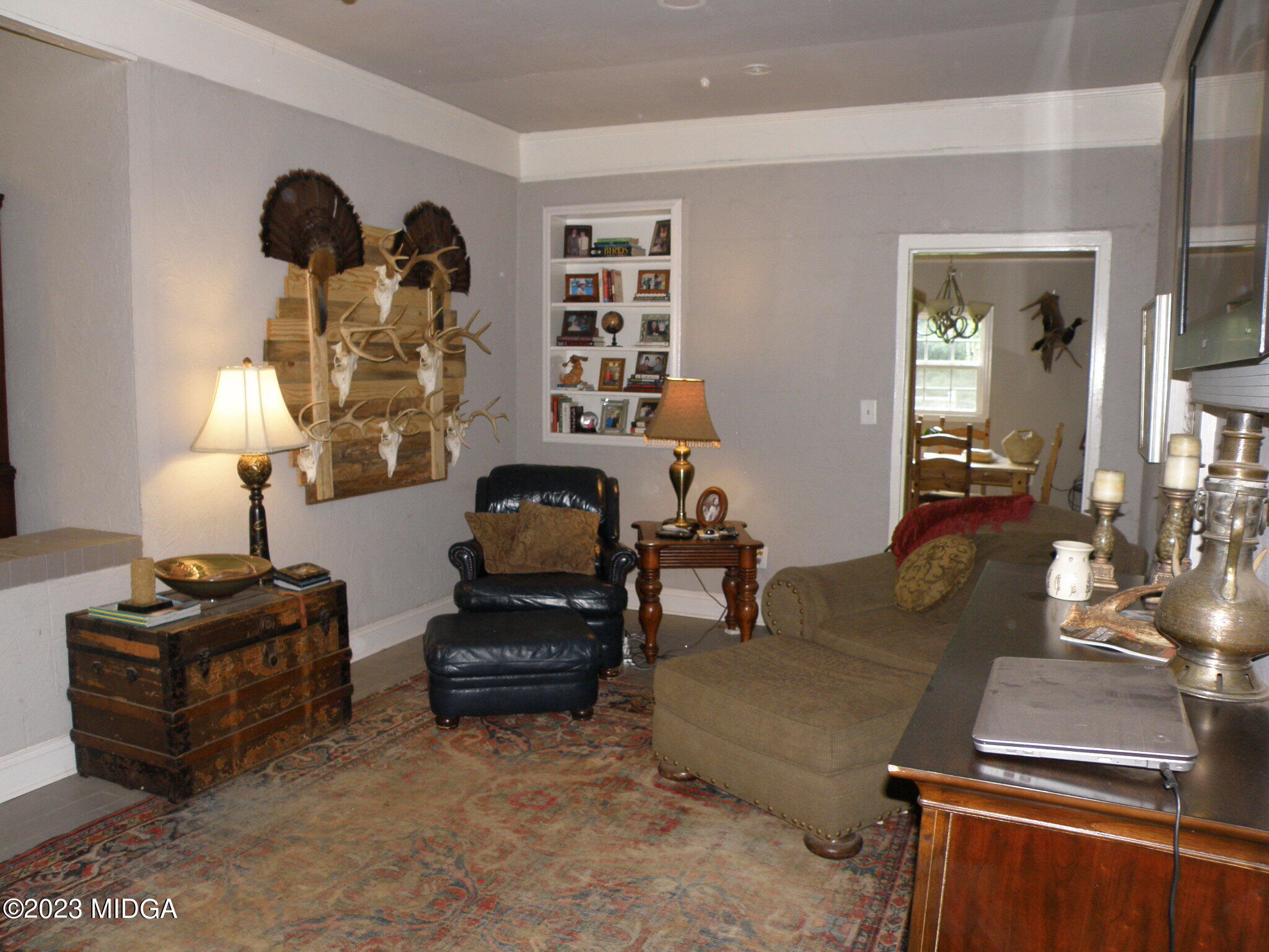 388 Fairview Church Road Forsyth, GA 31029 - Photo 8 of 41 a living room with furniture and wooden floor