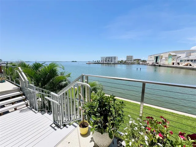 a view of a swimming pool with a house
