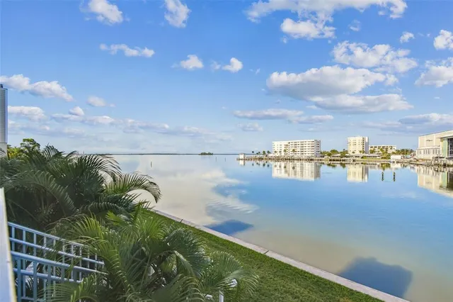 a view of a city with lawn chairs