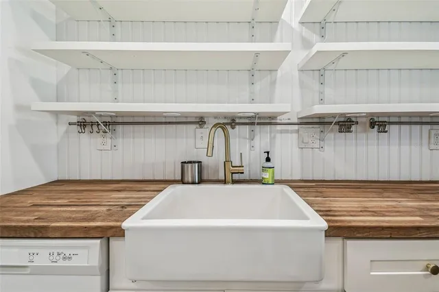 a view of balcony with furniture