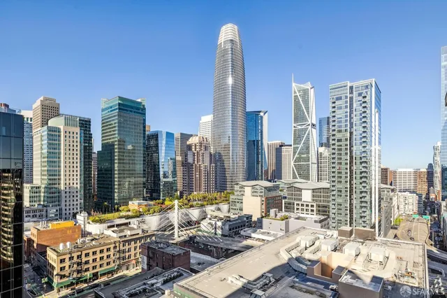 a view of city with tall buildings