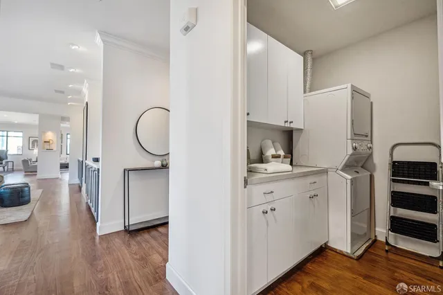 a bed room with a bed mirror and a window