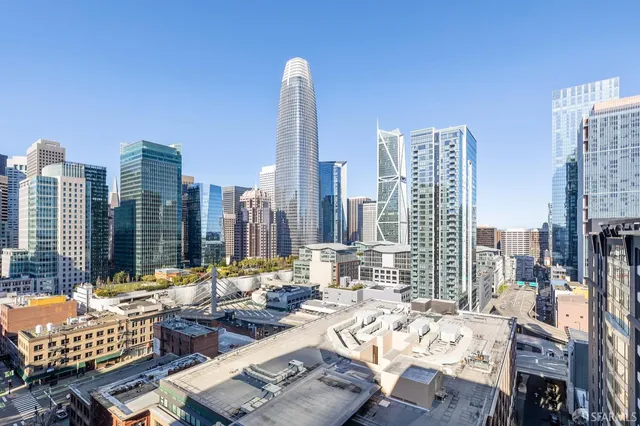 a view of city with patio outdoor seating