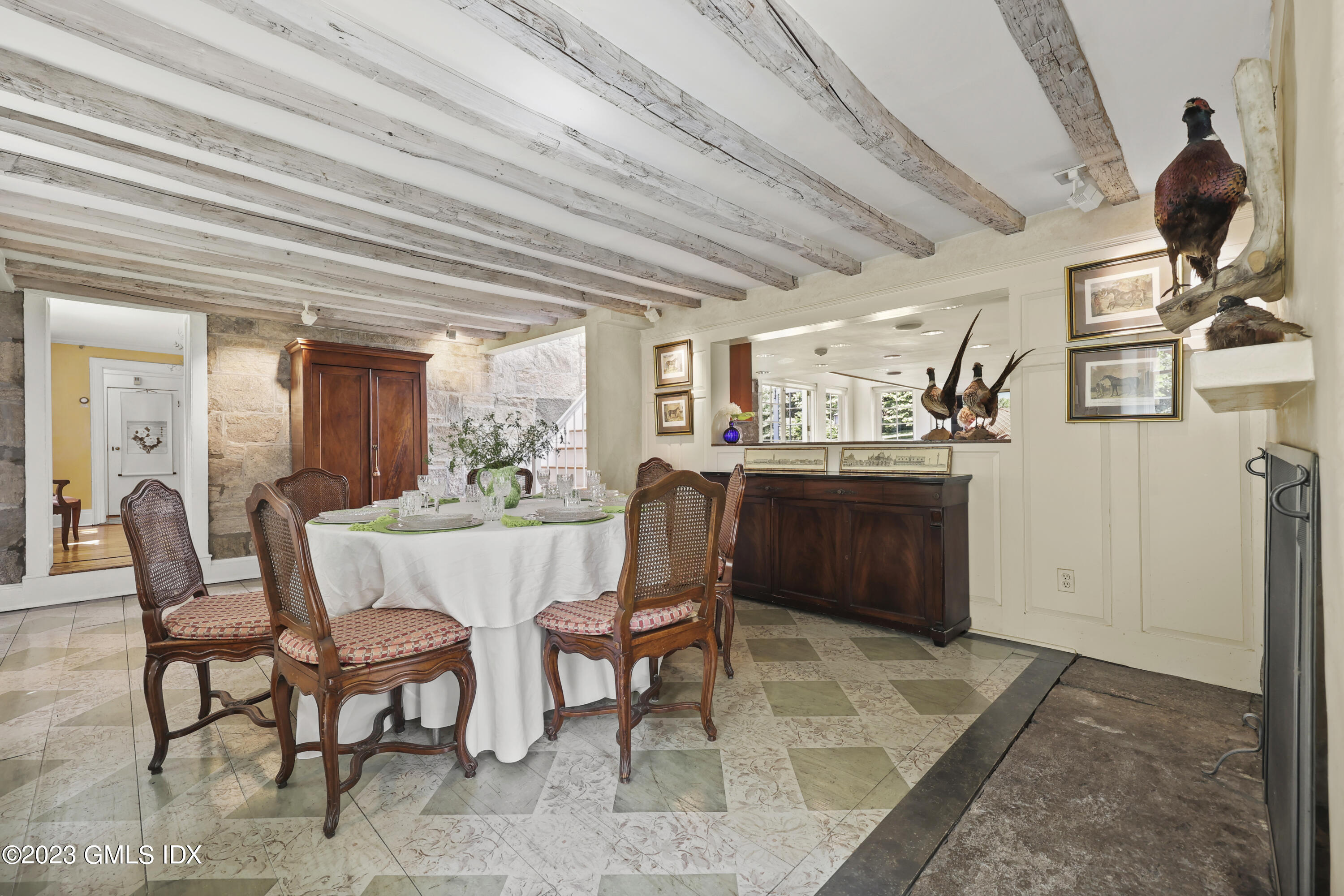 207 Farms Road Stamford, CT 06903 - Photo 22 of 47 a dining room with furniture and window