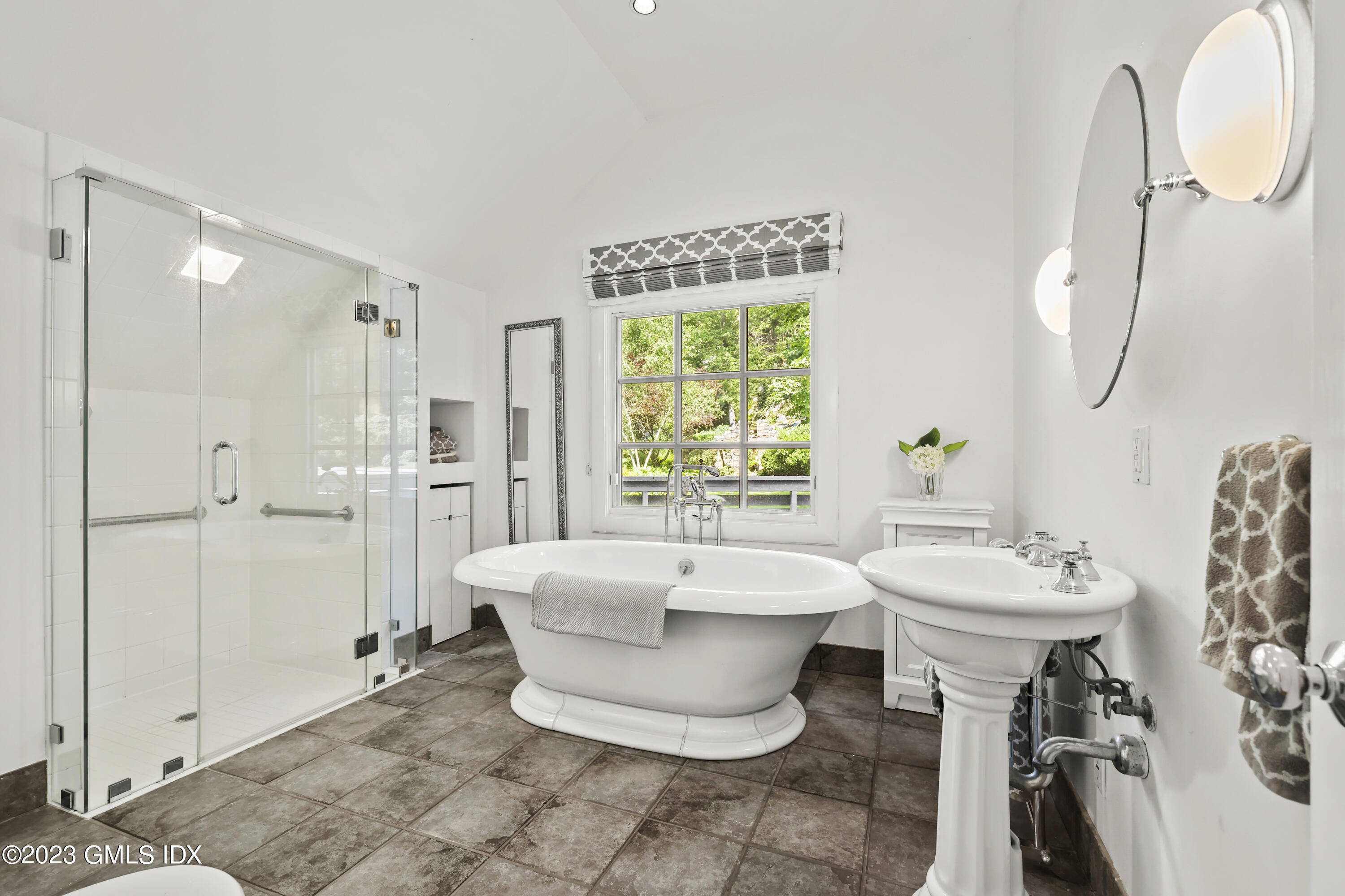 207 Farms Road Stamford, CT 06903 - Photo 42 of 47 a spacious bathroom with a sink and a mirror