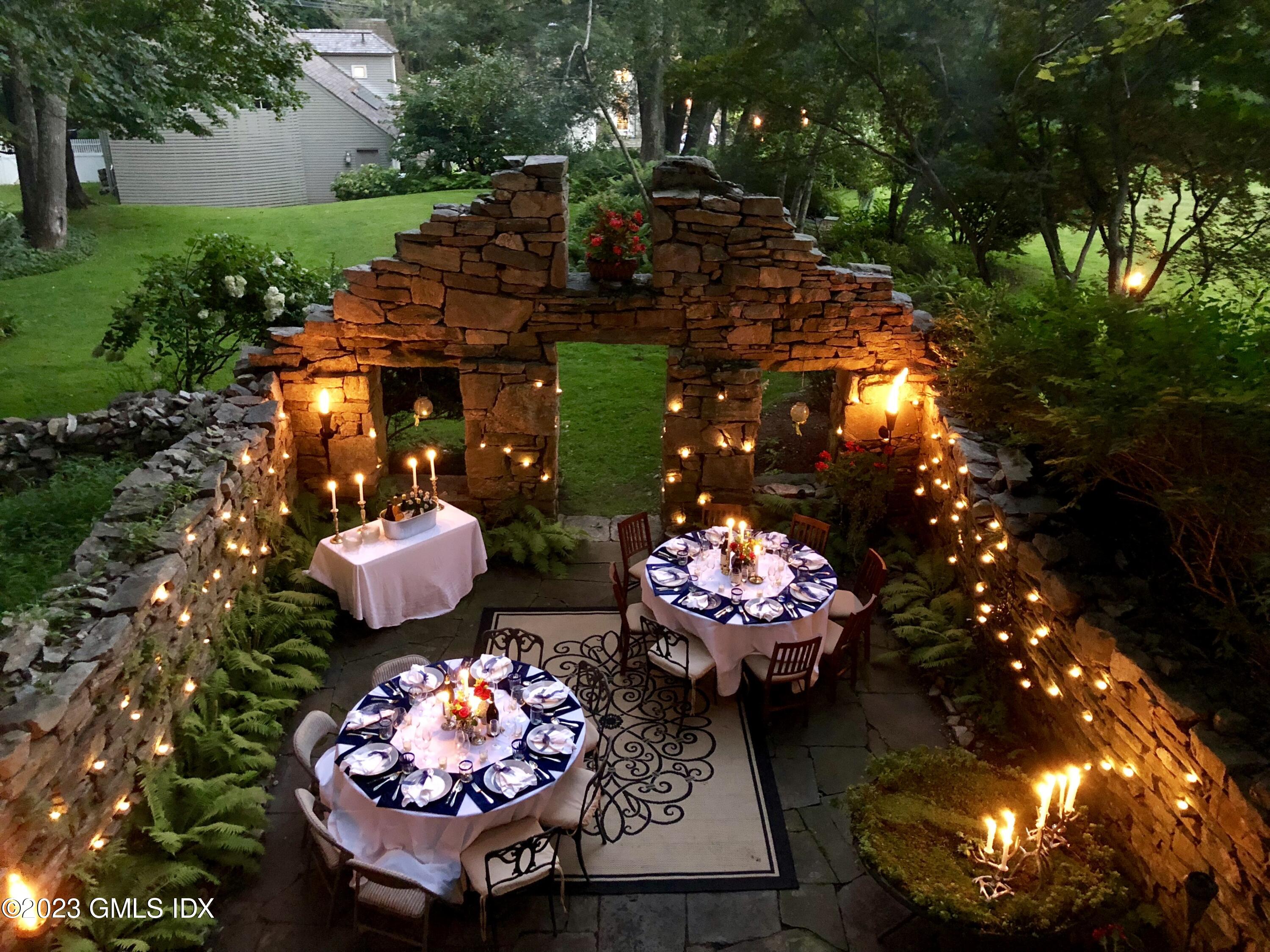 207 Farms Road Stamford, CT 06903 - Photo 10 of 47 a outdoor view with a fireplace and painted walls