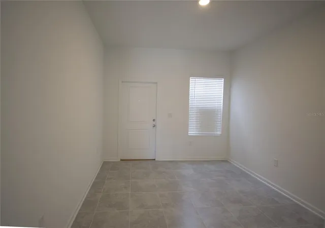 an empty room with a window