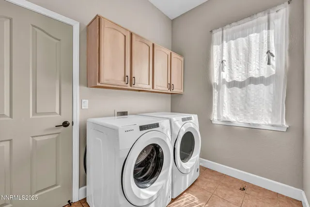 a bathroom with a granite countertop bathtub shower and toilet
