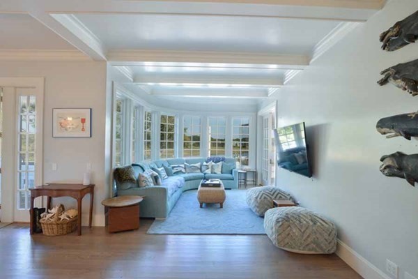 25 Oyster Way Barnstable, MA 02655 - Photo 23 of 42 a living room with furniture and a flat screen tv